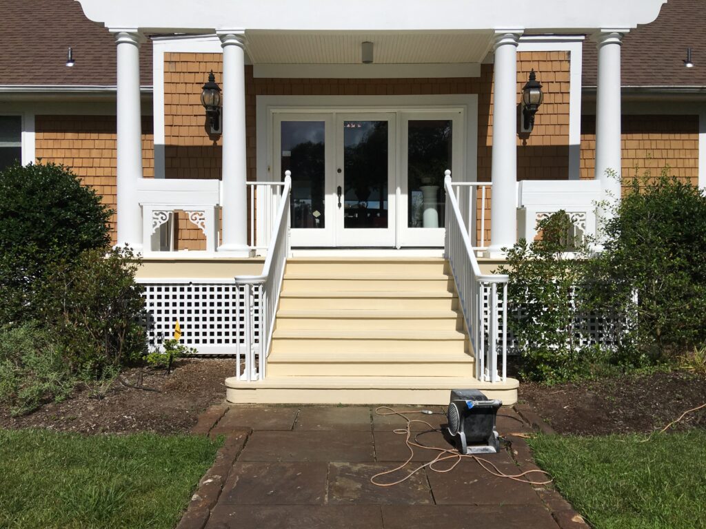 exterior-residential-painter-Millville-NJ-5b58cd6b57301 A house entrance with front porch stairs