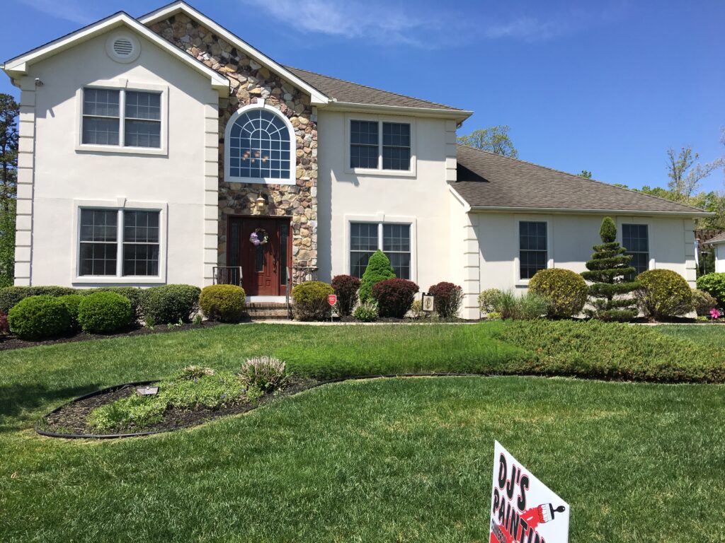 exterior-residential-painting-in-Vineland-NJ-5b33c945e47ca A modern home with stone wall