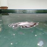 Eagles-logo-on-metallic-epoxy-floor-4-5e29cce79d5dc-1140x853