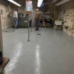 Garage space with concrete floor