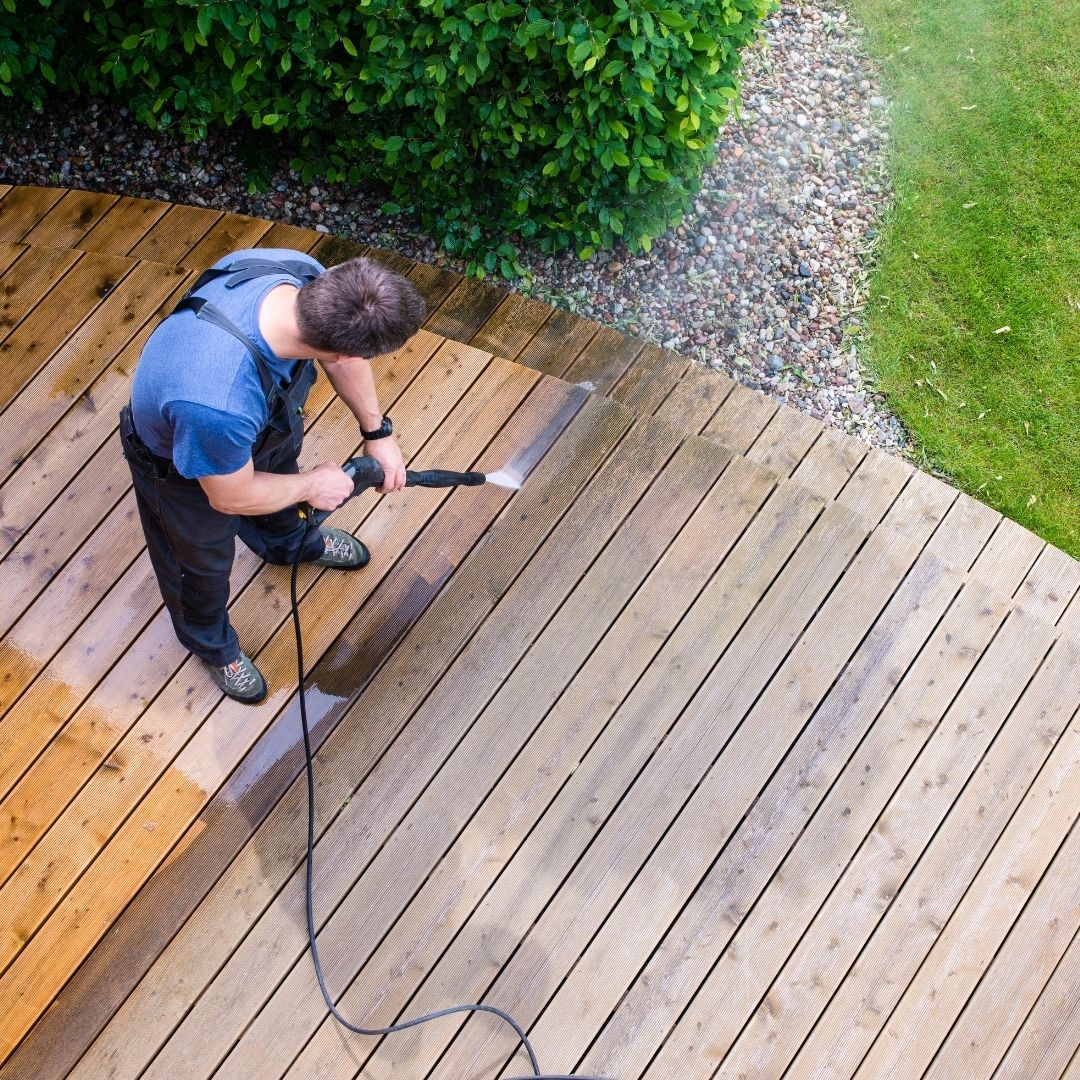 photo of someone cleaning their deck