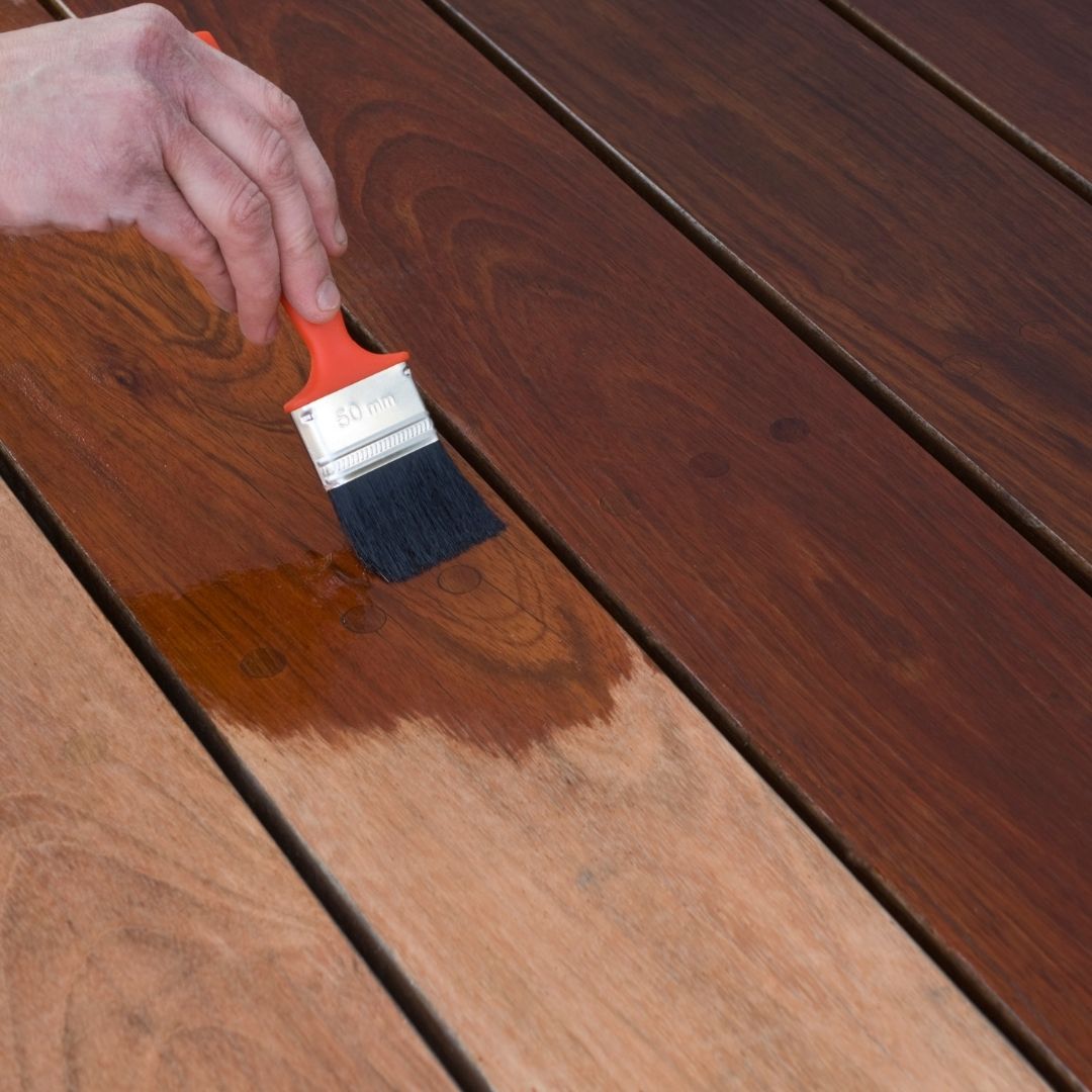 M7473 - DJs Painting - Steps to Stain Your Deck 3 close up photo of someone staining their deck