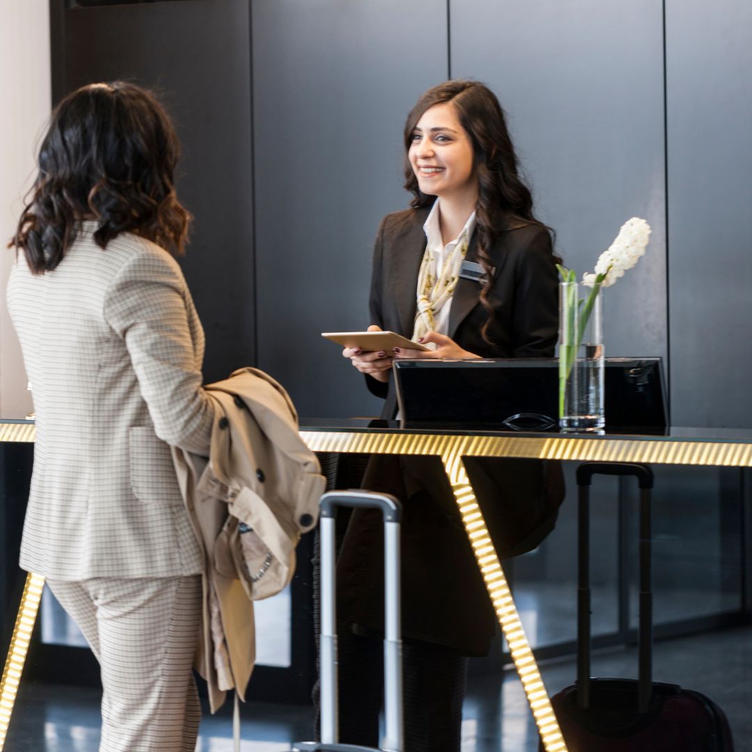 guest checking into hotel