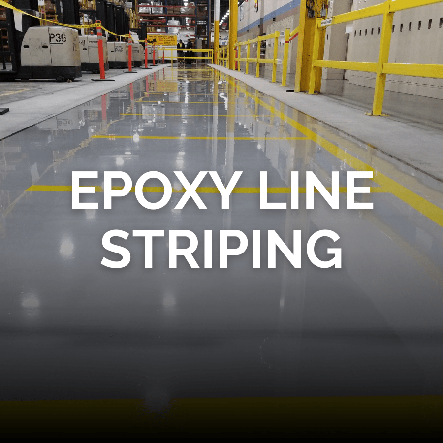 Yellow lines painted with epoxy on a glossy, gray floor with the words Epoxy Line Striping across the middle
