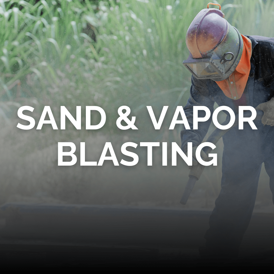 A professional abrasive sand blasting or vapor blasting rusted metal with the words Sand and Vapor Blasting across the middle
