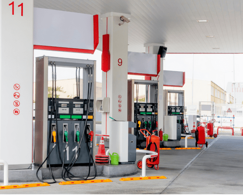 gas station painting (2) freshly painted metal gas pumps and columns