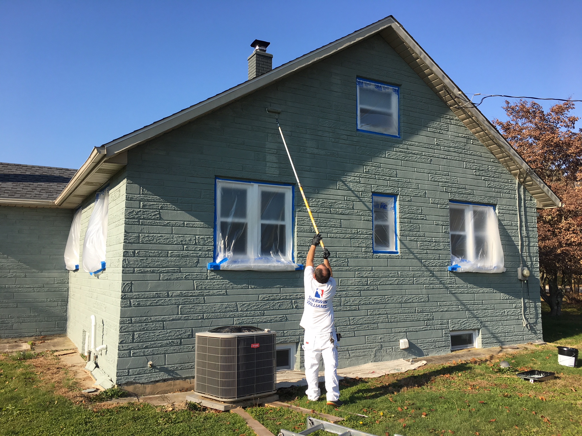 masonry block wall painting on an exterior residential property in Upper Deerfield NJ