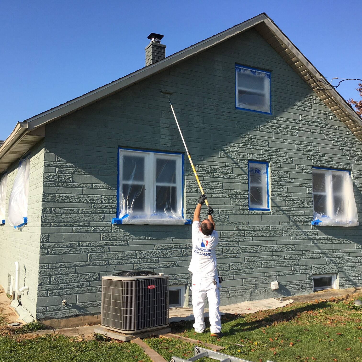 masonry block wall painting on an exterior residential property in Upper Deerfield NJ